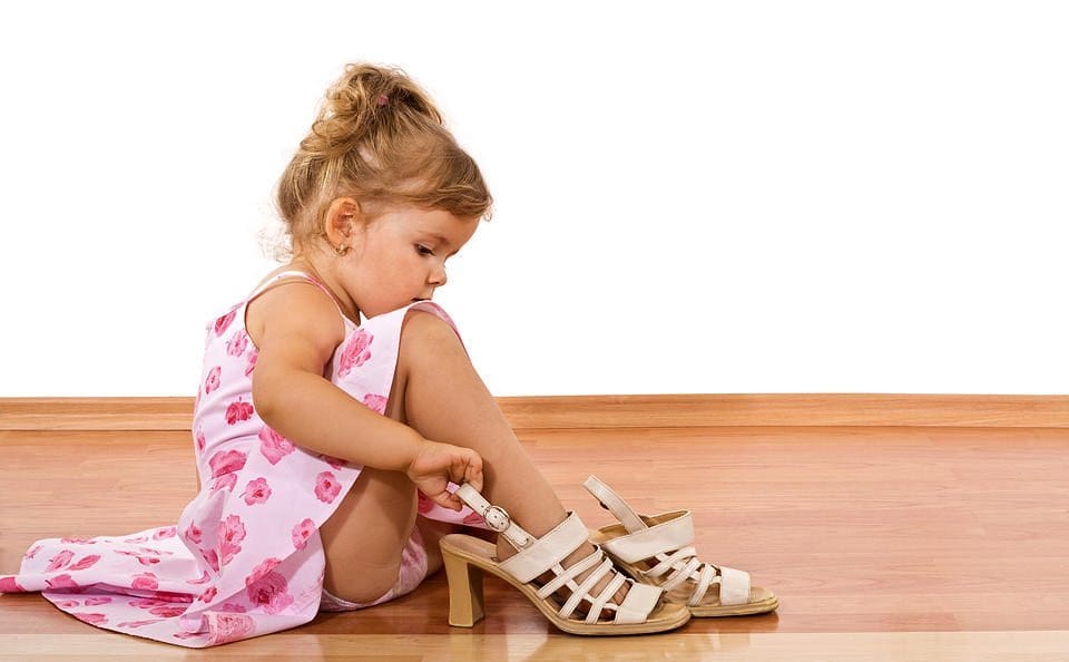 baby girl with shoes